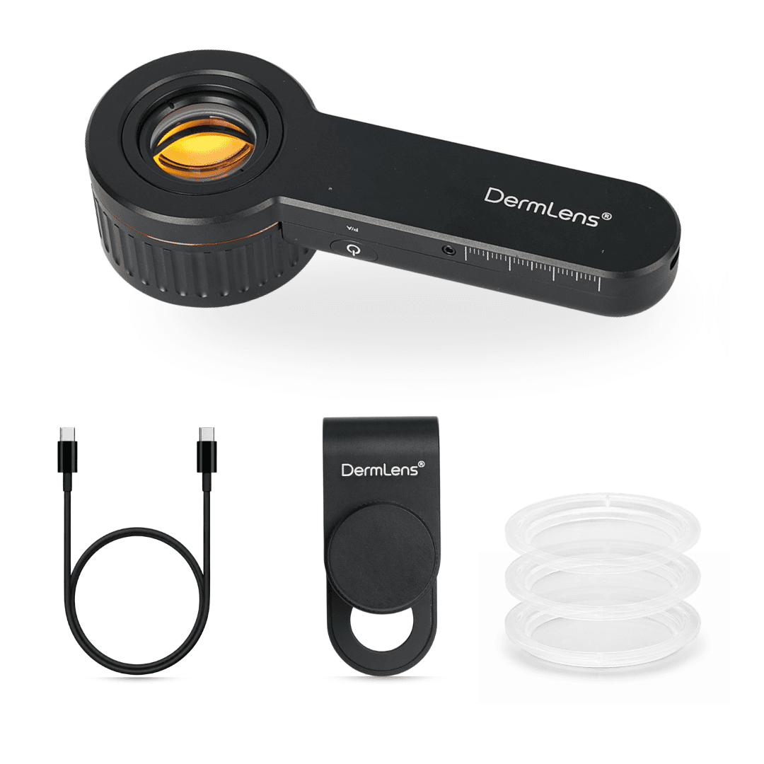 DermLens M6 package contents — dermatoscope, USB-C cable, magnetic smartphone adaptor and disposable caps